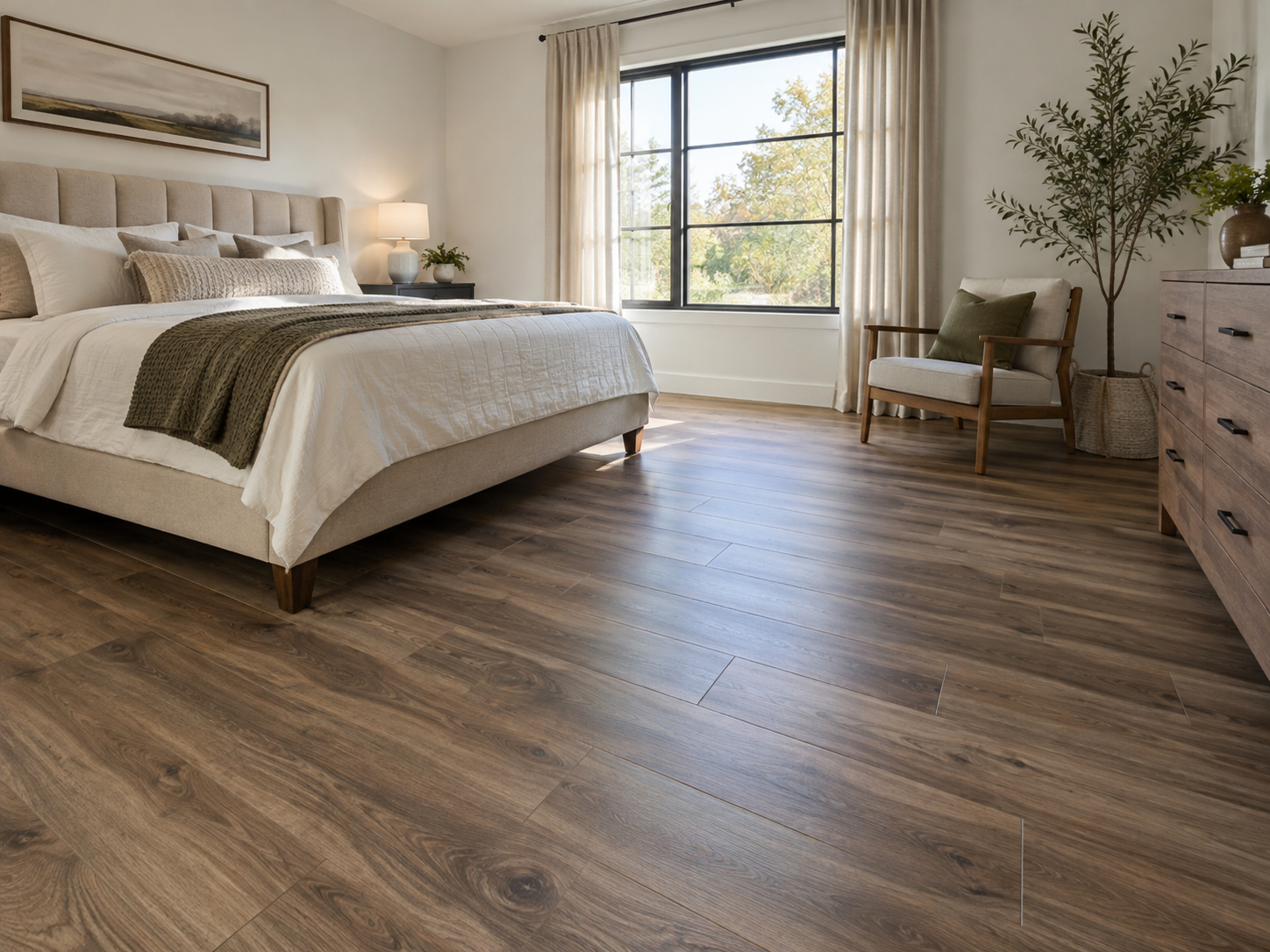 Dark wood flooring in a finished bedroom