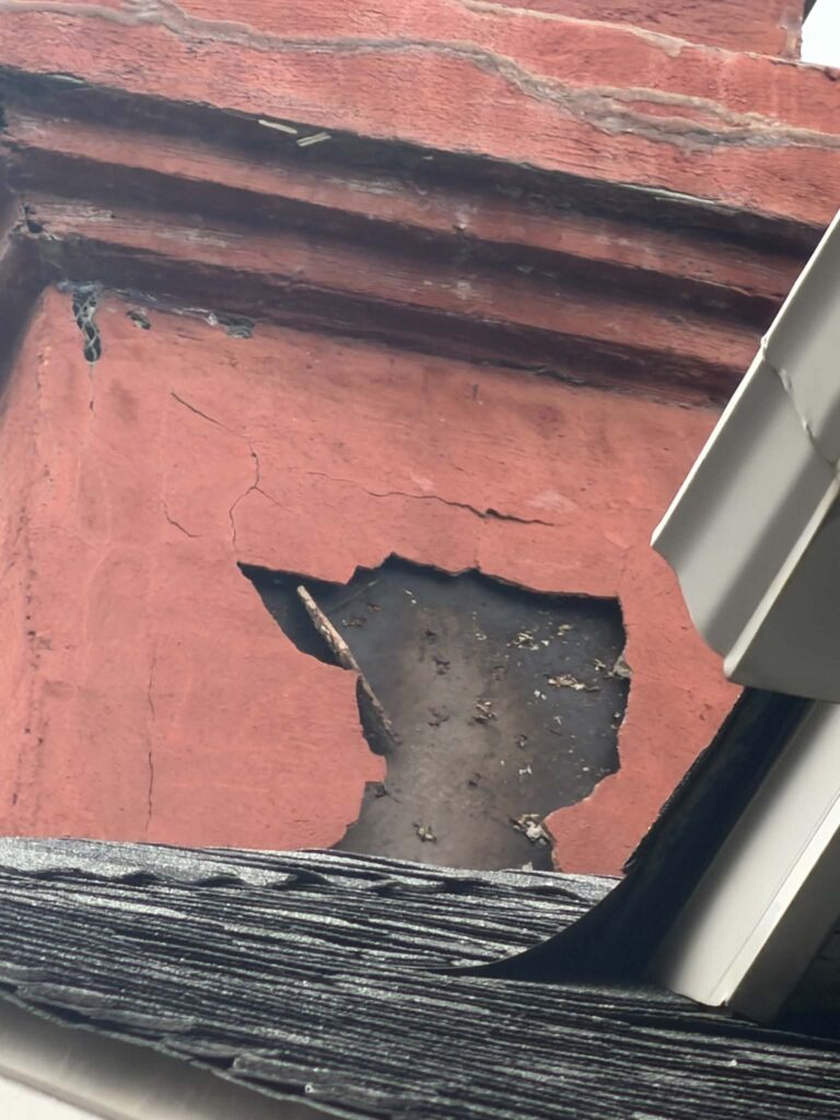 Visible surface damage at a chimney repair area