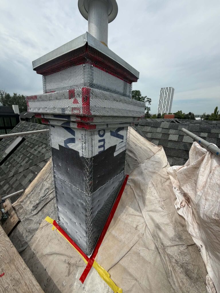 Chimney repair in progress with wire mesh preparation
