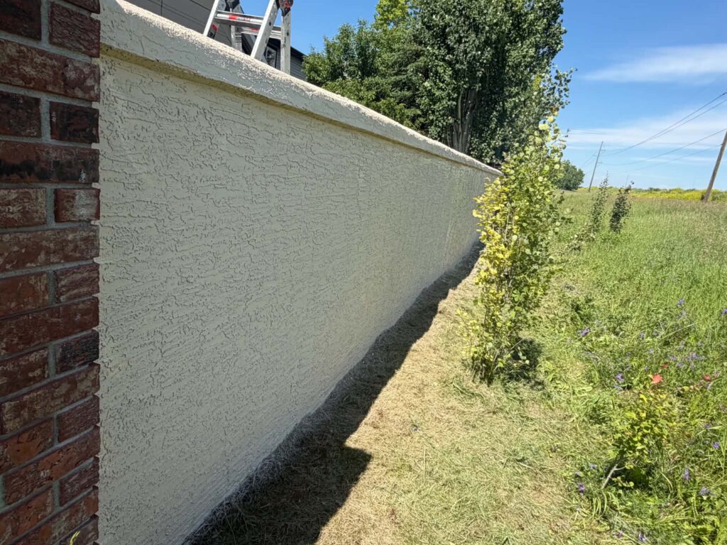 Finished stucco fence detail